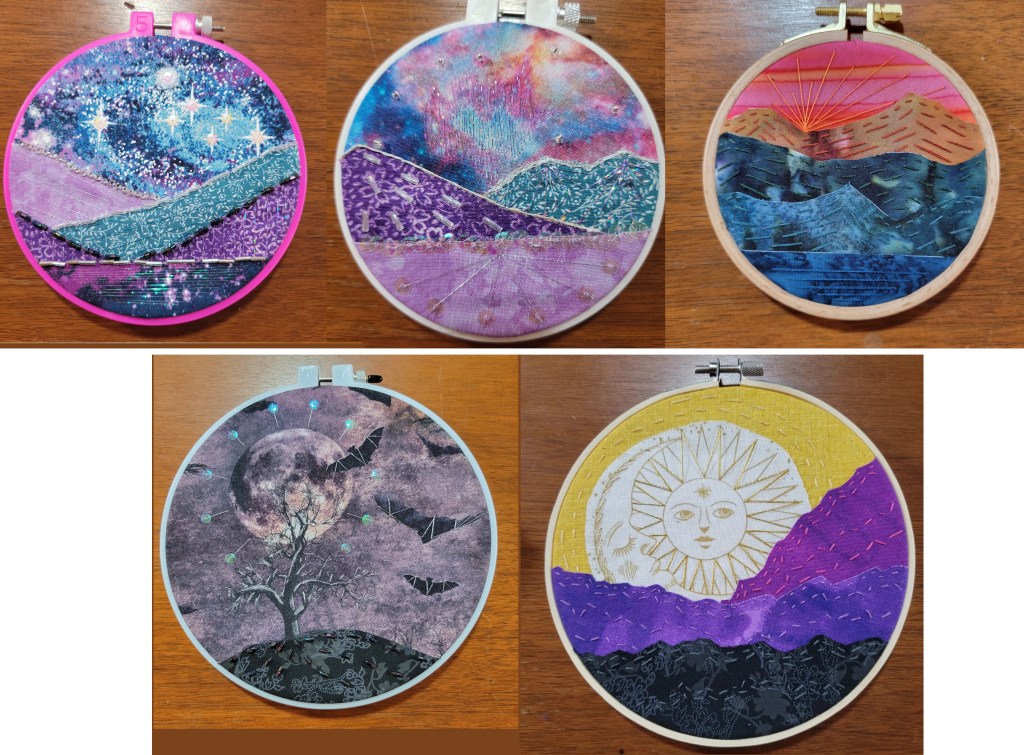 5 landscapes made of different fabrics layered on top of each other and adorned with beads, sequins, iridescent thread, and contrasting stitches. The top three are mountains. The bottom left is a spooky tree with bats and a large moon in the background, and the last is a sun/moon behind purple mountains (done in the colors of the nonbinary flag.)